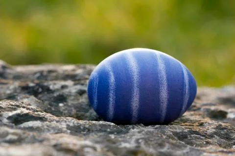 Nest of natural-colored Easter eggs Stock Photos