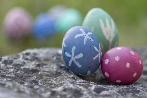 Nest of natural-colored Easter eggs Stock Photos