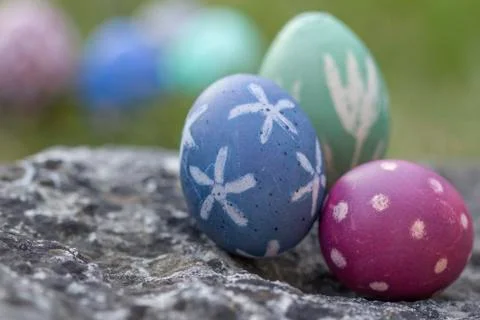 Nest of natural-colored Easter eggs Stock Photos