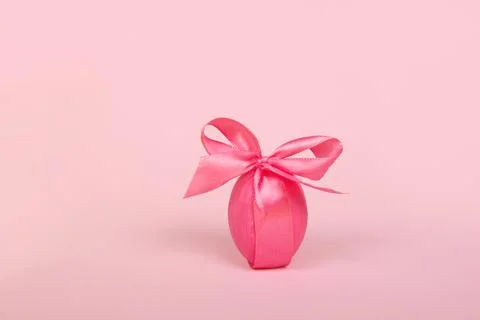 Nest with painted easter eggs on yellow background Stock Photos