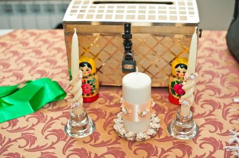 Nested dolls candle and chest. Stock Photos