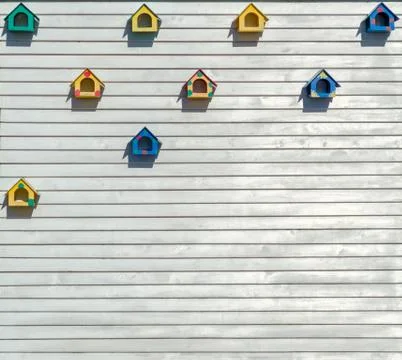 Nesting boxes on wooden plank Stock Photos
