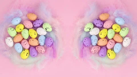 Nests with feathers and Easter eggs on pink theme. Stop motion Video stock 148788904