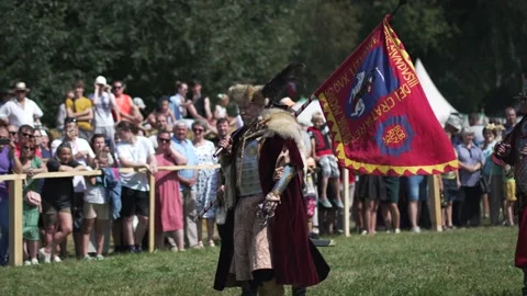 Nesvizh Castle, BLR - Aug 13, 2022 Two chiefs talk and then start a sword fight Stock Footage 204900536