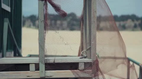 Net blowing in the wind on stairs Stock Footage 10881404