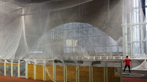 Net for throwing the discus. The person is on the point of doing to throw the di Stock Footage 85536493