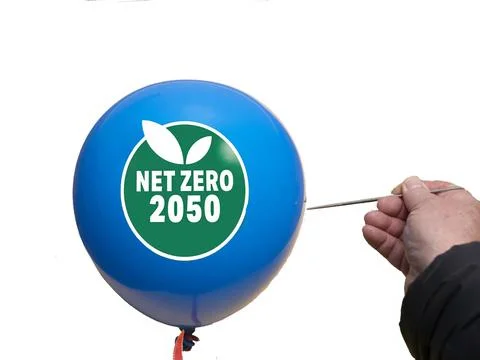 Net zero and carbon neutral concept.Net Zero text on a balloon with 2050 mi.. Stock Photos