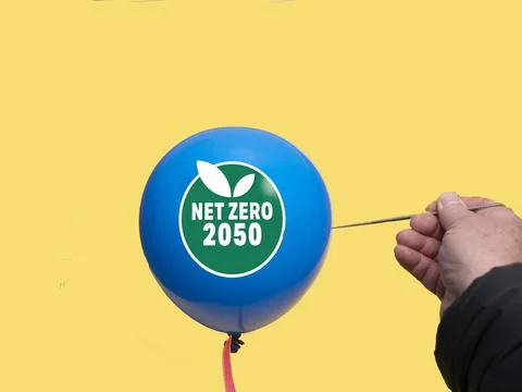 Net zero and carbon neutral concept.Net Zero text on a balloon with 2050 mi.. Stock Photos