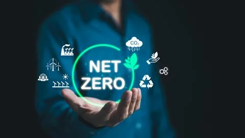 Net Zero emissions concept. Man holding to carbon reduction icons. 스톡 사진