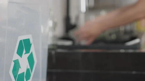Net zero go green waste rinse clean dry empty bottles before recycling Video stock 248411474