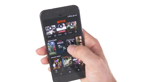 Netflix on a Smartphone Screen White Background Stock Footage 96217189