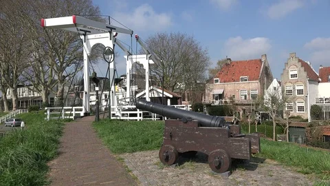 Netherlands Schoonhoven cannon points toward drawbridge Stock Footage 80272407