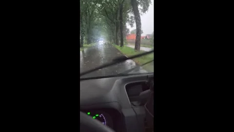 Netherlands: Thunderstorms Bring Hail and Damaging Winds to Multiple Prov... Stock Footage 336034014