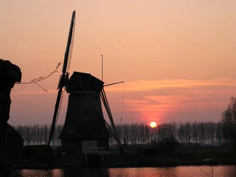 Netherlands Wind Mill at Sunset Stock Photos