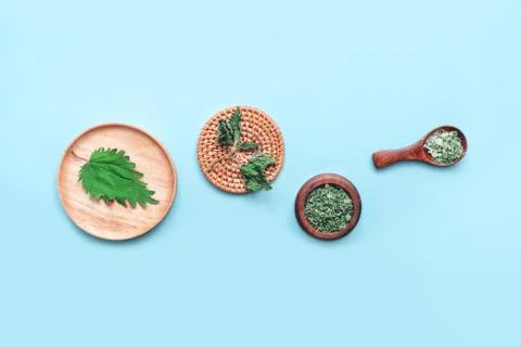 Nettle leaves on background Stock Photos