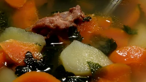 Nettle soup with beef stew Stock Footage 252867016