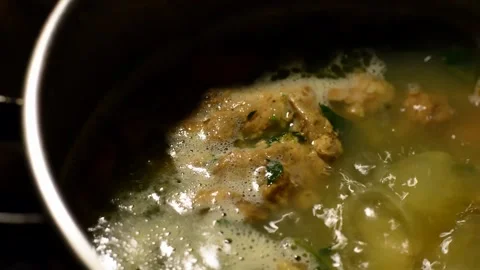 Nettle soup with beef stew Stock Footage 255810950