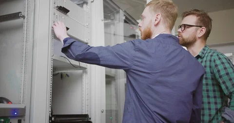 Network administrator switches server communicators Stock Footage 107917585