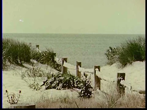 A network affiliate radio station broadcasts to vacationing beachgoers and Stock Footage