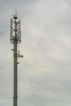 Network antenna on a gray cloudy day Stock Photos