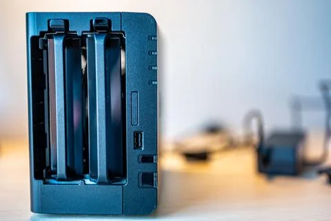 Network attached storage NAS with a single bay pulled setup at a home office and Foto stock