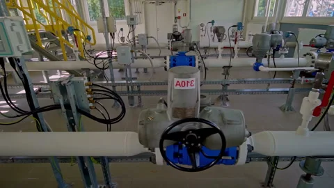 A Network of Automated Pipelines, Control Systems, and Industrial Valves Inside Stock Footage 336779879