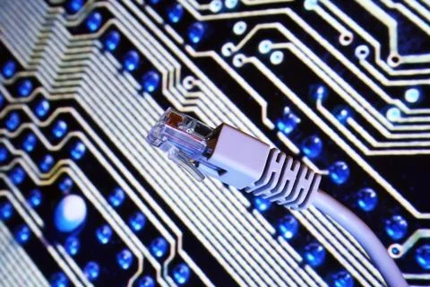 Network cable on circuit board 2 Stock Photos