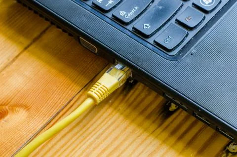 Network cable connect to  computer Stock Photos
