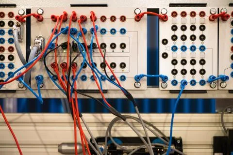 Network cable connecting on network core switch. Machine power controller Foto stock