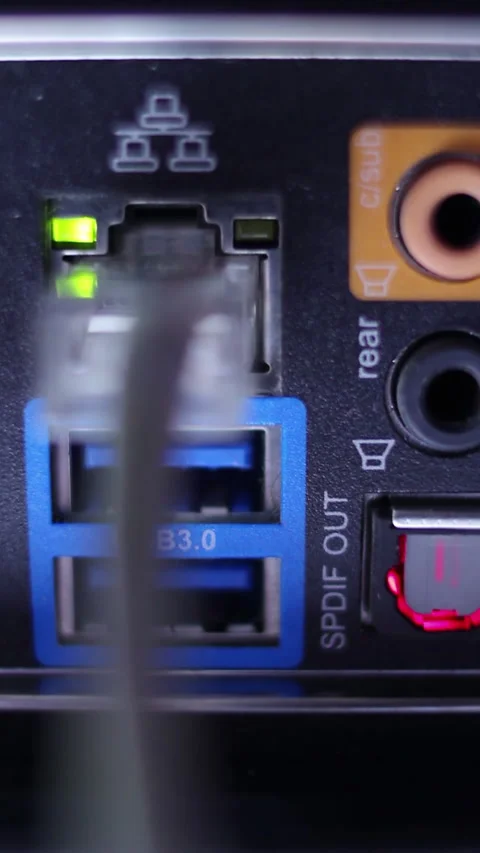 Network cable connection closeup plugging in, blinking LEDs. Vertical video. Stock Footage 270295222