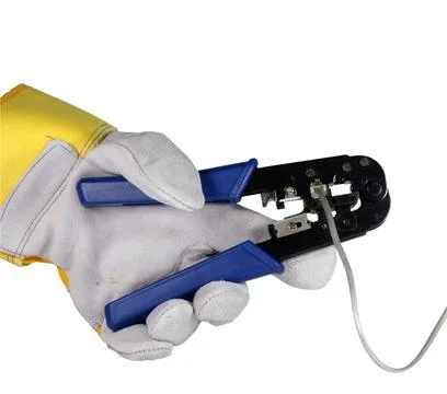 Network Cable Crimping Tool in Gloved Hand on White Background Stock Photos