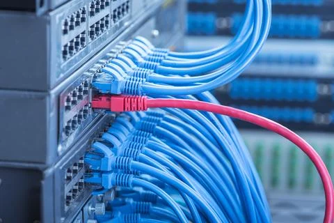 Network cable with high tech technology color background Stock Photos