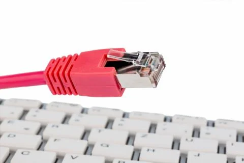 Network cable on keyboard Foto stock