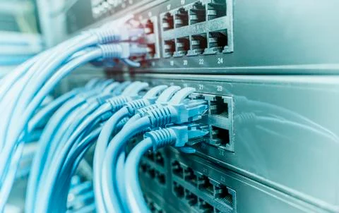 Network cable panel, switch in data center Stock Photos