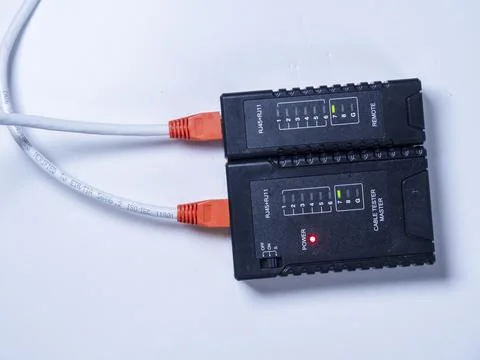 Network cable performance tester. Technician measure a cables connected on .. Foto stock