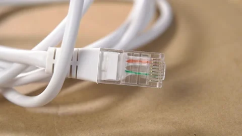 Network cable plug close up. Ethernet connection equipment. Internet cord on  Stock Footage 169017914