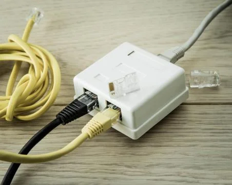 Network cables and hub Stock Photos
