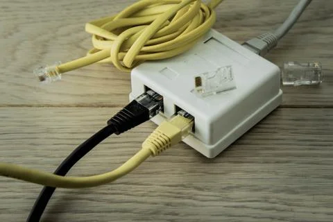 Network cables and hub Stock Photos