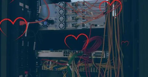 Network cables and servers in data center with heart graphics overlay Stock Photos