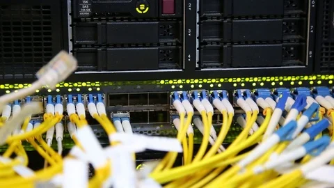 Network cables being switched to data server close up with depth of field 스톡 동영상 106888585