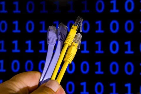 Network cables with binary code background Foto stock