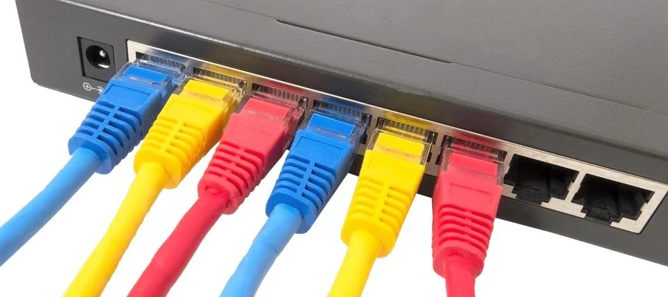 Network cables connected to router Stock Photos