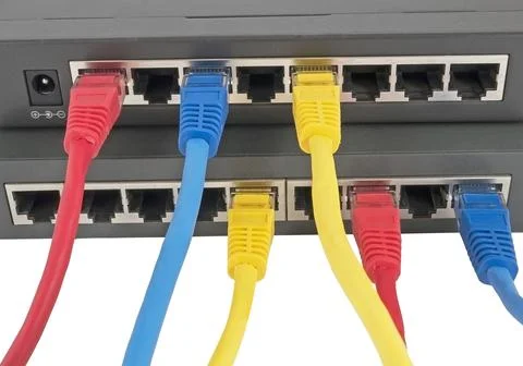 Network cables connected to router Stock Photos