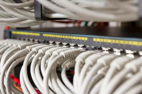 Network cables connected in switch Stock Photos