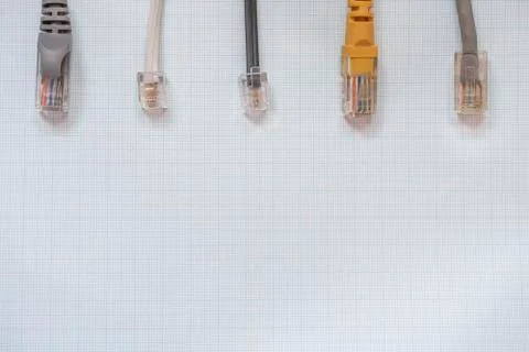 Network cables for connection on a millimeter background Stock Photos