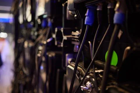 Network Cables in a Data Center Server Rack with blurred connections and te.. Stock Photos