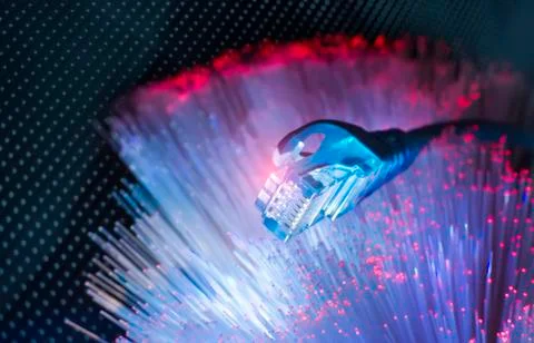 Network cables with fiber optical background Stock Photos