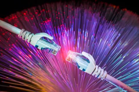 Network cables with fiber optical background Stock Photos