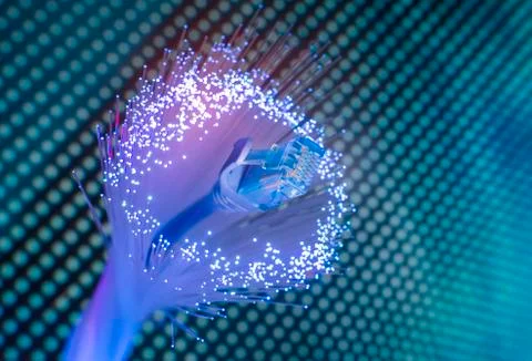 Network cables with fiber optical background Stock Photos