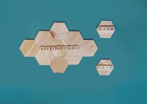 Network concept showing data flow through connected hexagons Photos